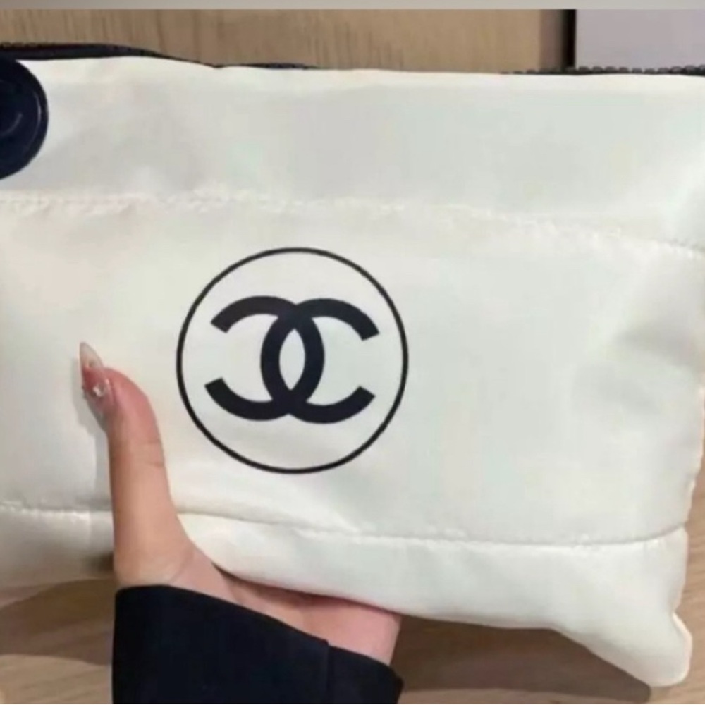 New rare and collectible puffy pouch,clutchor cosmetic bag with zipper in white